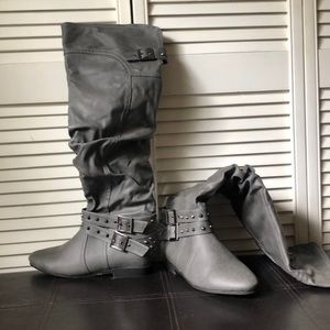 Grey knee high boots with studs
